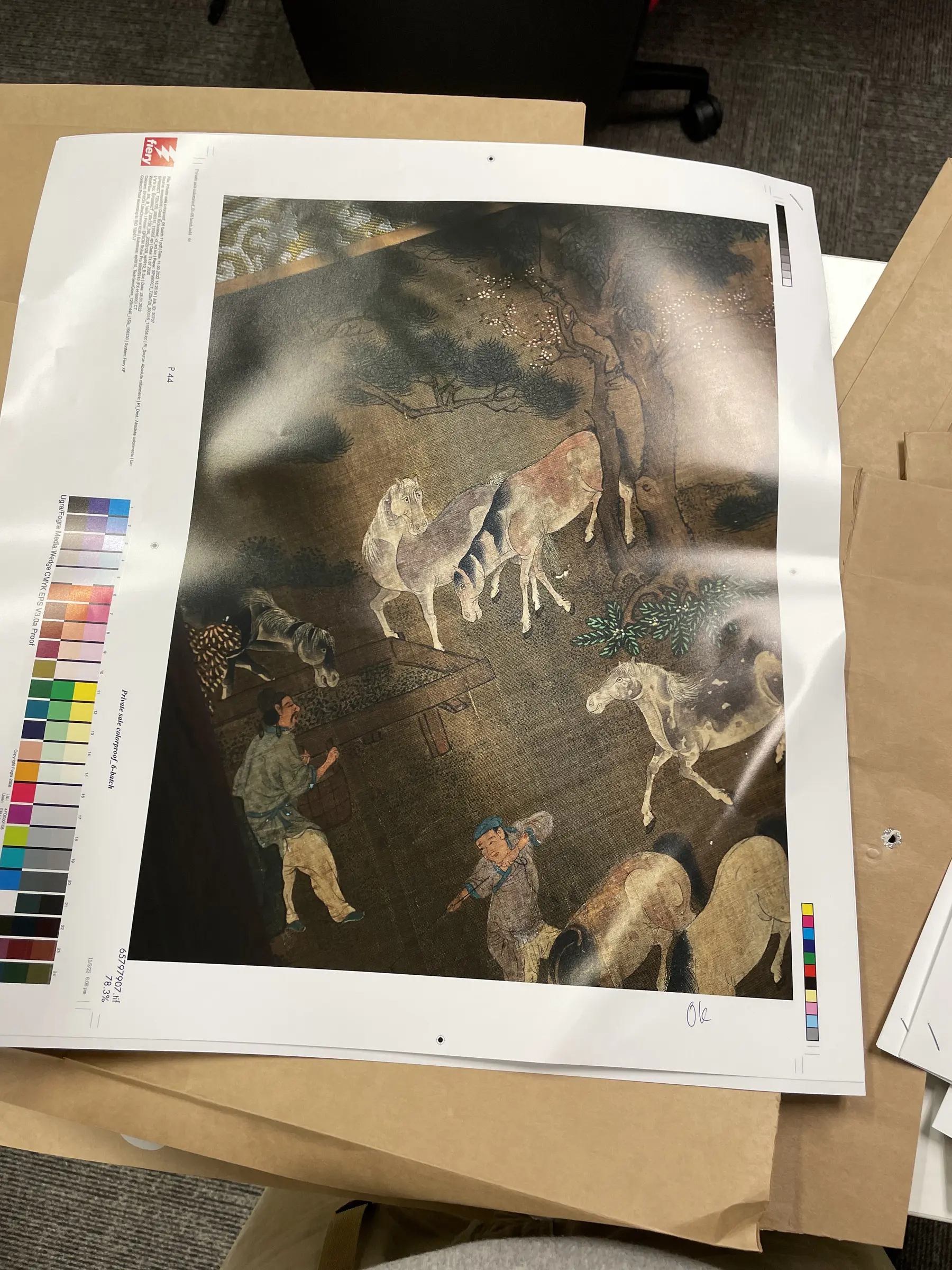 Second page proof with control strip and image variation.